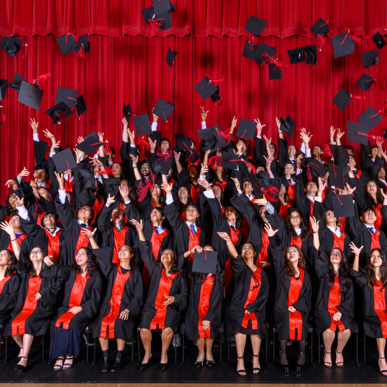 Y13 Grad Hat Toss Col Sim