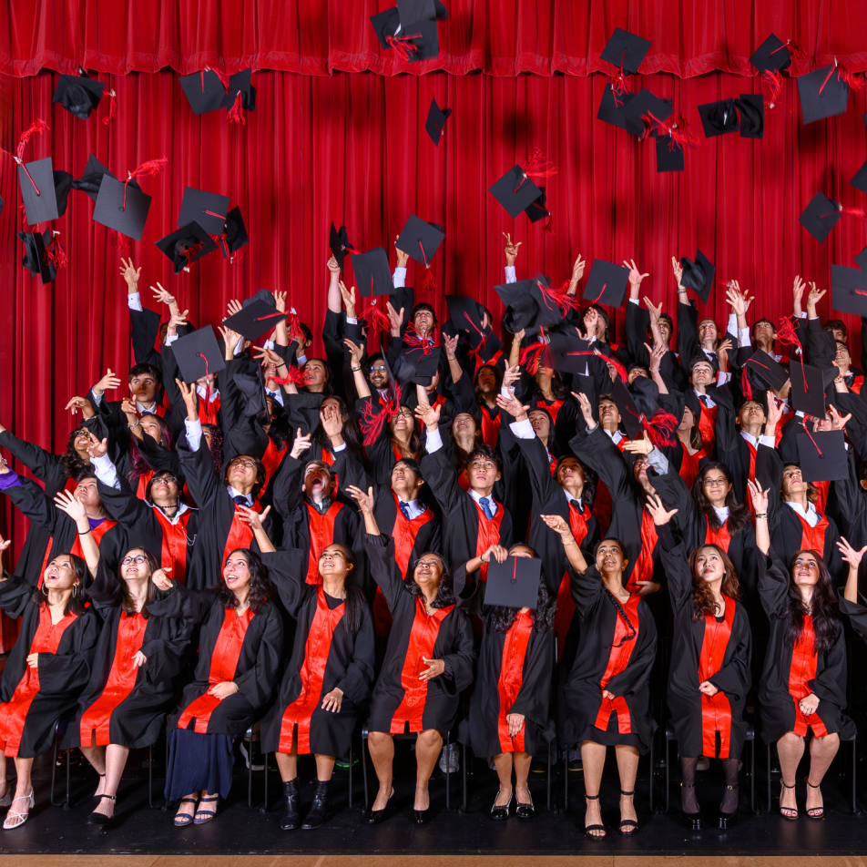 Y13 Grad Hat Toss Col Sim